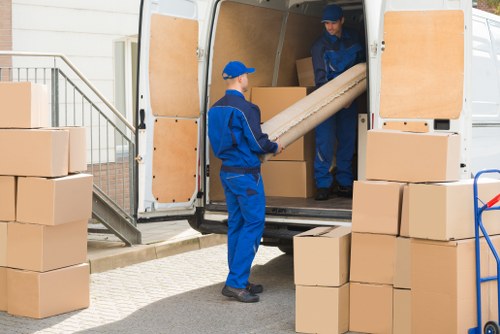Same day removals team loading boxes in St Johns Wood