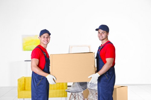 Local removals crew handling boxes in St Johns Wood