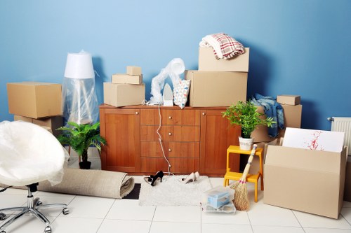Moving boxes and furniture prepared for house removals in Stjohnswood