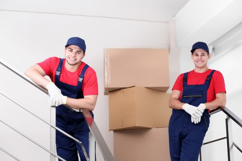 Local removals team loading furniture near St Johns Wood apartments