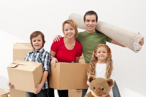 Local movers packing belongings in a St Johns Wood property