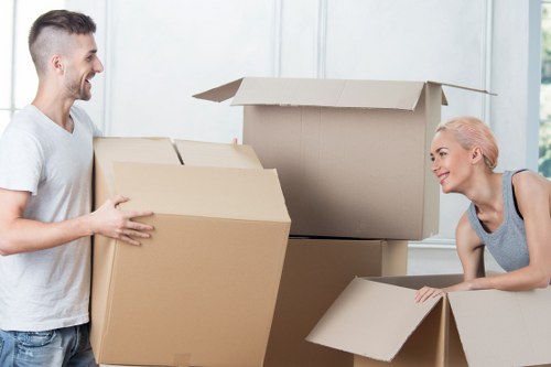 Professional movers handling apartment relocation in Stjohnswood