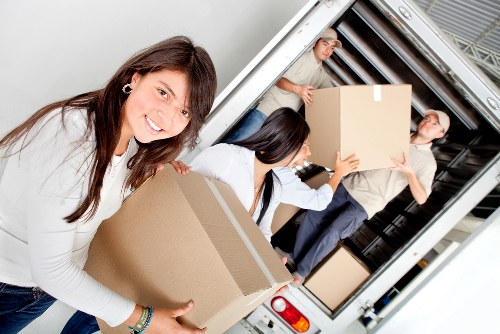 Unpacking service arranging items in a St Johns Wood apartment